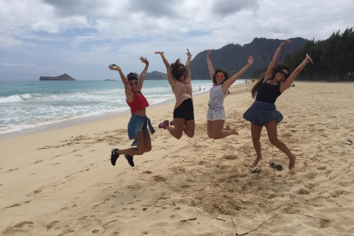 a group of people on a beach