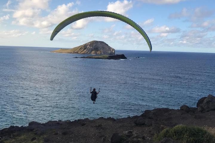a rocky shore next to a body of water