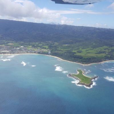 a view of a large body of water with a mountain in the background