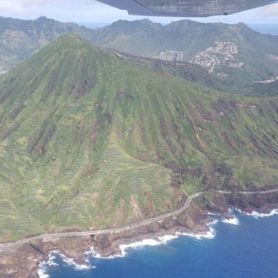 a body of water with a mountain in the background