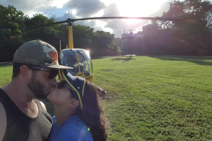 a man that is standing in the grass
