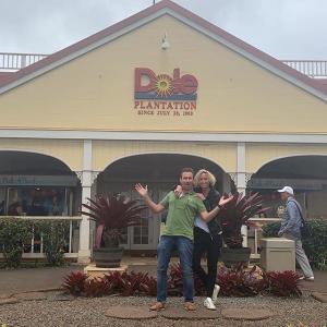 a group of people standing in front of a building