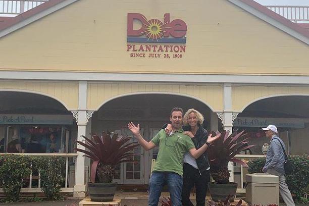 a group of people standing in front of a building