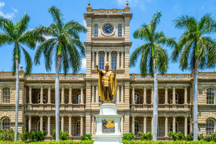 a large clock tower in front of a building